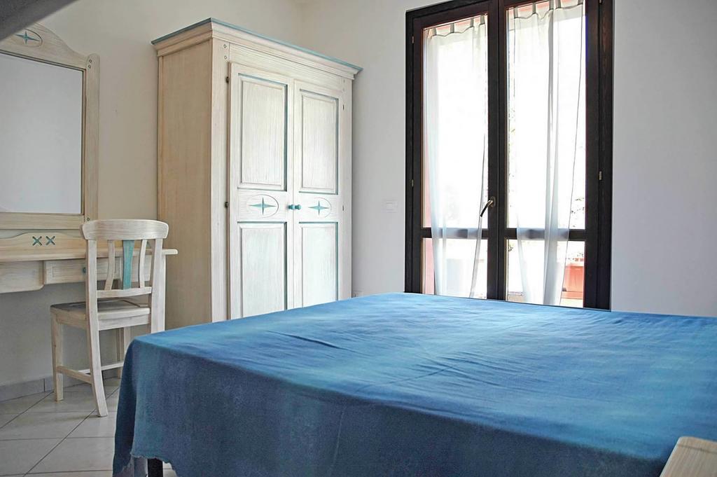 Apartamento Baia Fiorita Porto Azzurro Habitación foto
