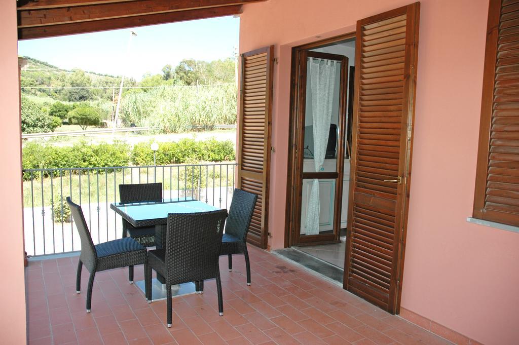 Apartamento Baia Fiorita Porto Azzurro Exterior foto