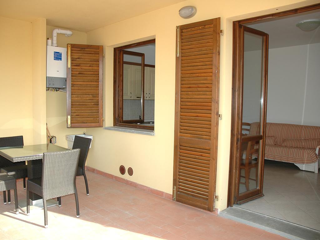Apartamento Baia Fiorita Porto Azzurro Exterior foto