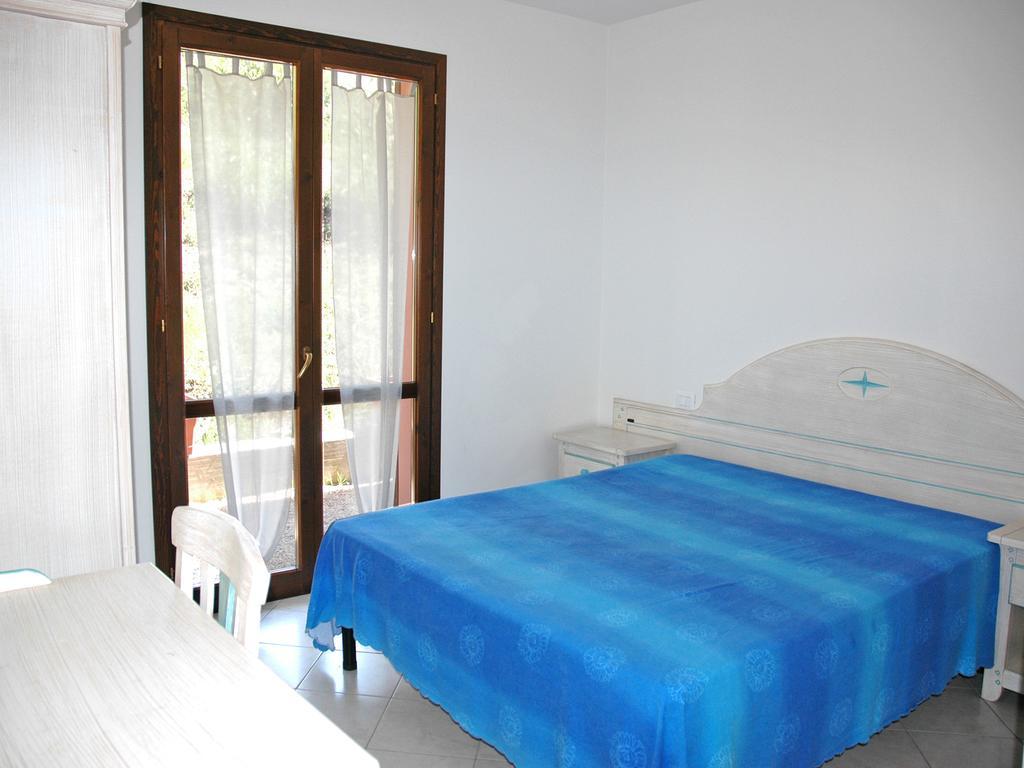 Apartamento Baia Fiorita Porto Azzurro Exterior foto